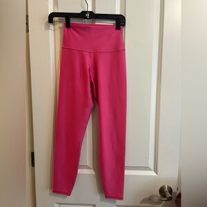Alo leggings in a hot pink color. Size xs.